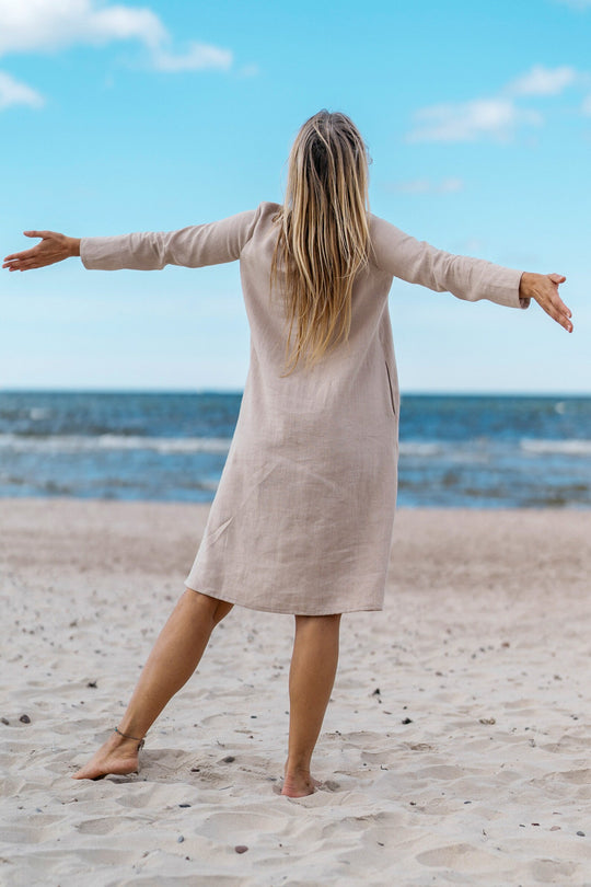 Model Demonstrates Linen Oversized Dress AURA Natural Color In Beach 2 - Daily Linen