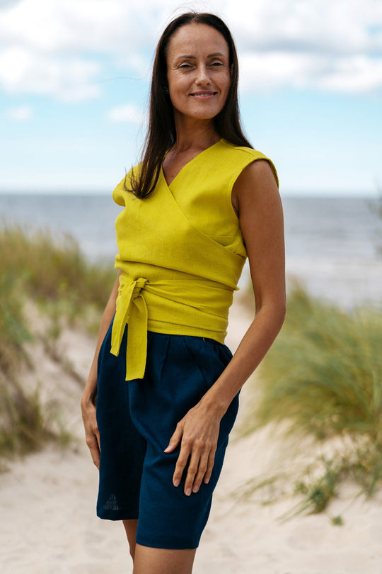 Model Demonstrates Sleeveless Linen Wrap Top Julia in Yellow Color 1 - Daily Linen