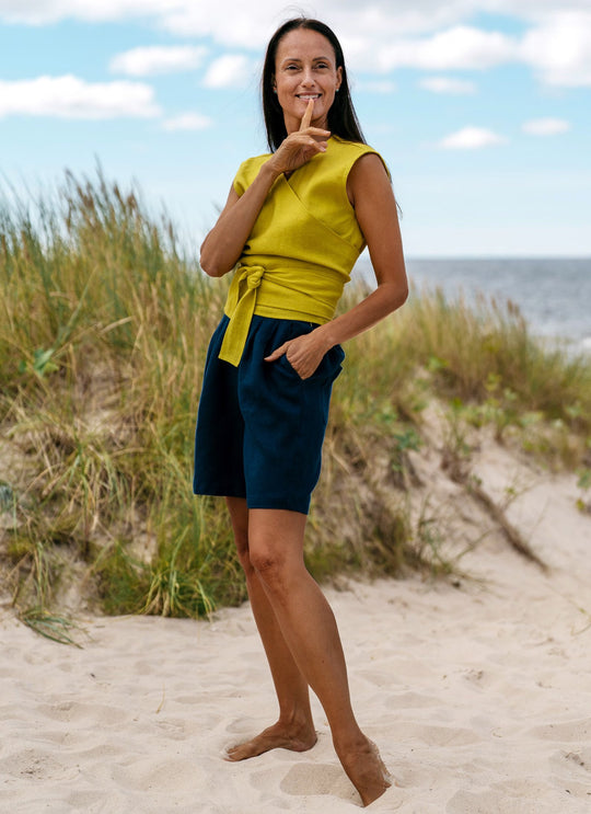 Model Demonstrates Sleeveless Linen Wrap Top Julia in Yellow Color Up View - Daily Linen