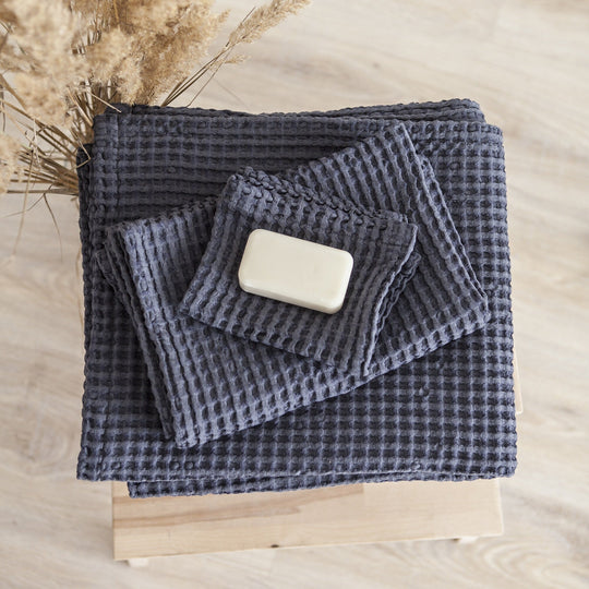 Set of 3 blue waffle linen towels with soap