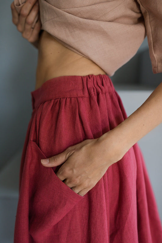 Women shows linen skirt side pocket