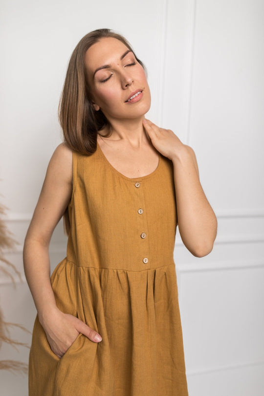 Model Wears Sleeveless Linen Dress Barbara In Amber Yellow Collor Made By Daily Linen 1