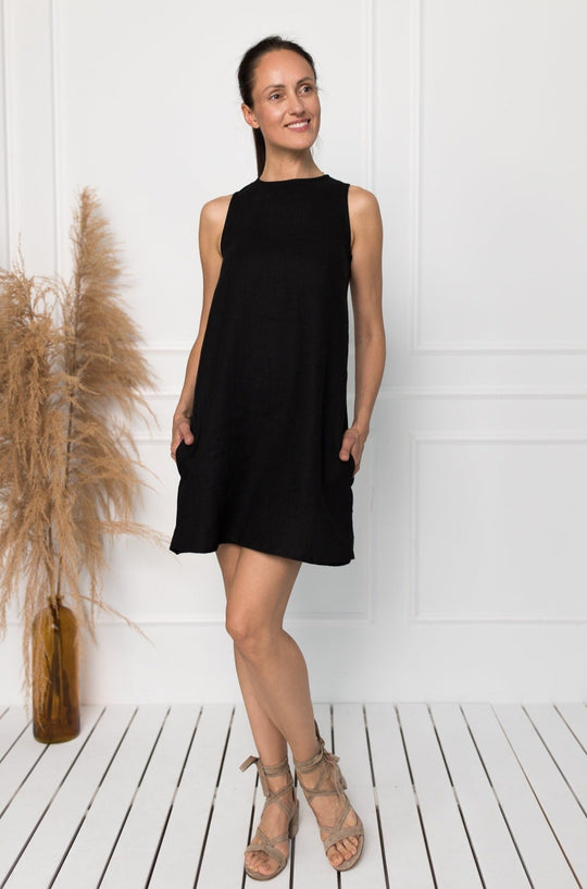 Model Demonstrates Linen Trapeze Dress Victoria In Black Color - Daily Linen