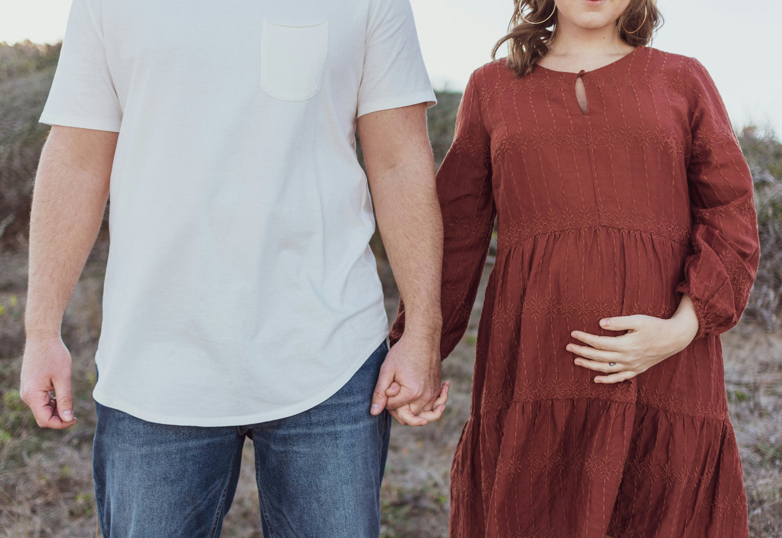 men and women holding each other's hands