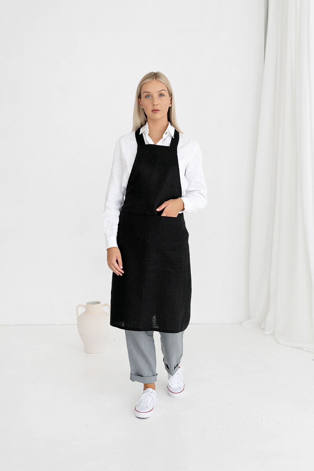 Model Wears Linen Bib Apron In Black Color - Daily Linen