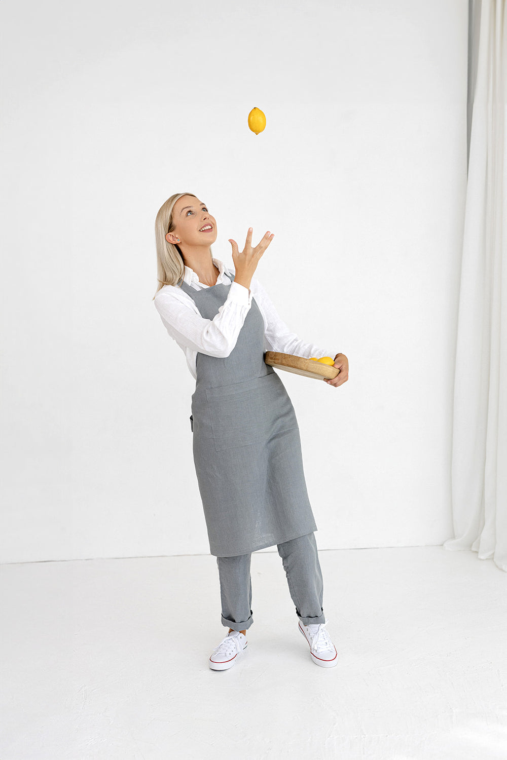 Model Wears Linen Bib Apron In Grey Made By Daily Linen 1