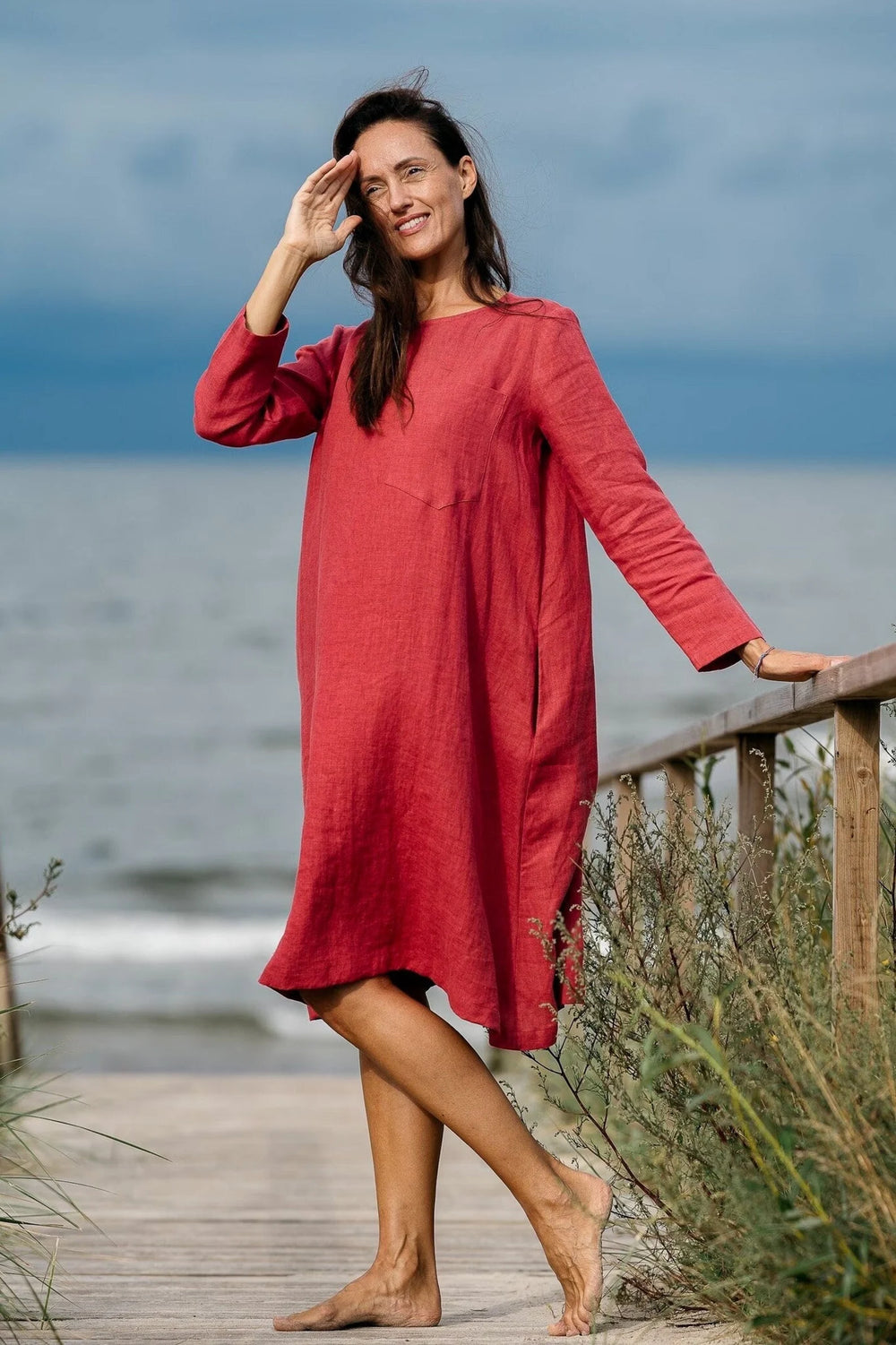 Model Demonstrates Linen Oversized Dress AURA In Raspberry Color At Beach 1 - Daily Linen