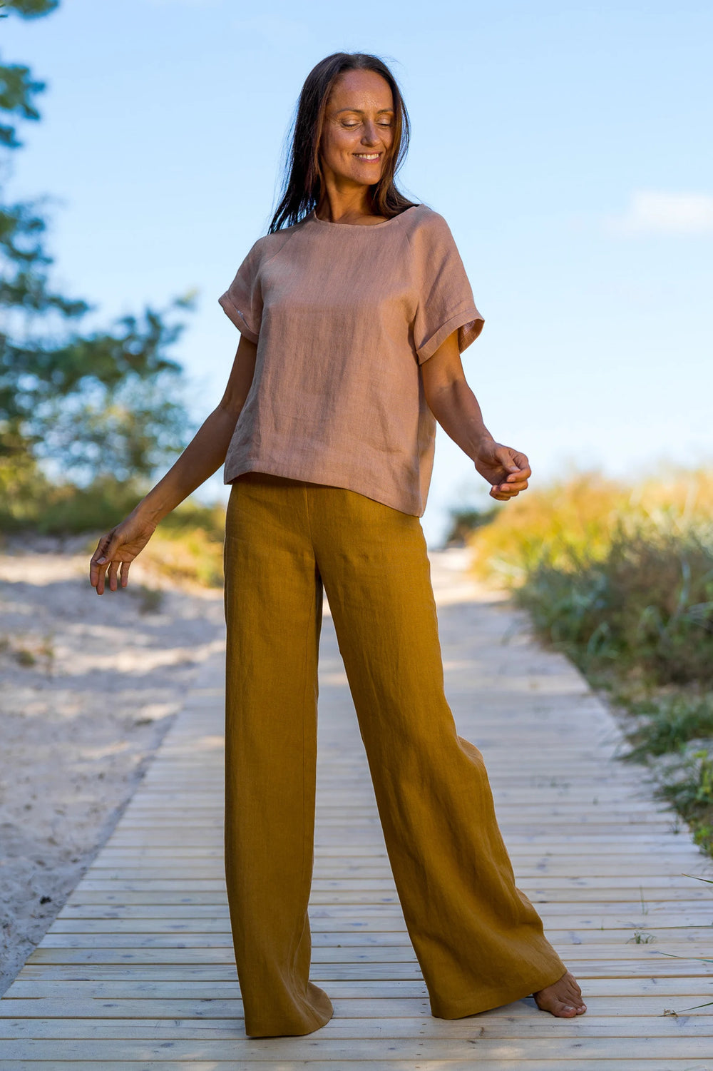 Model Wears Linen Palazzo Pants Klara In Amber Yellow Color 1 - Daily Linen