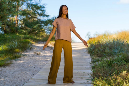 Model Wears Linen Palazzo Pants Klara In Amber Yellow Color 2 - Daily Linen