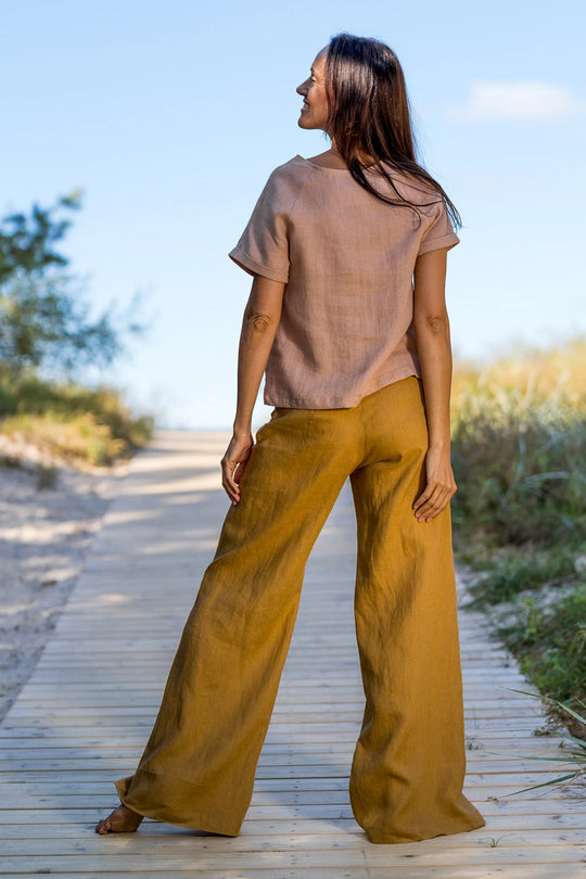 Model Wears Linen Palazzo Pants Klara In Amber Yellow Color 3 - Daily Linen