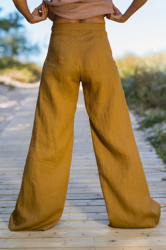 Model Wears Linen Palazzo Pants Klara In Amber Yellow Color 4 - Daily Linen
