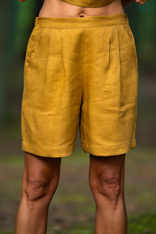 Women Wears Linen Pleated Shorts Bergen In Amber Yellow Color  - Daily Linen