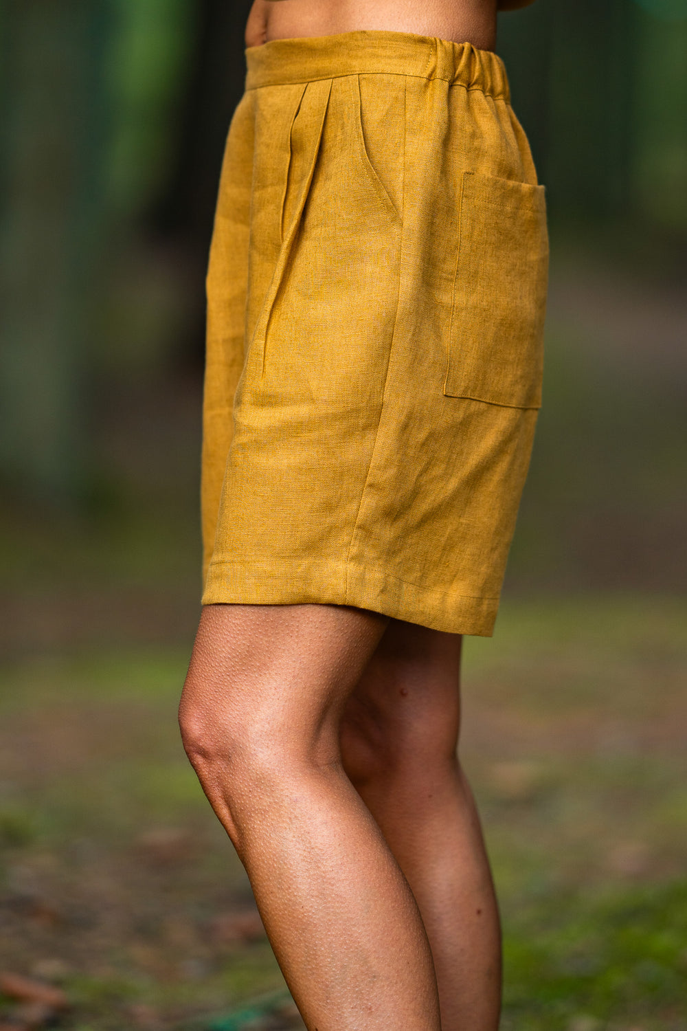 Women Wears Linen Pleated Shorts Bergen In Amber Yellow Color 1 - Daily Linen