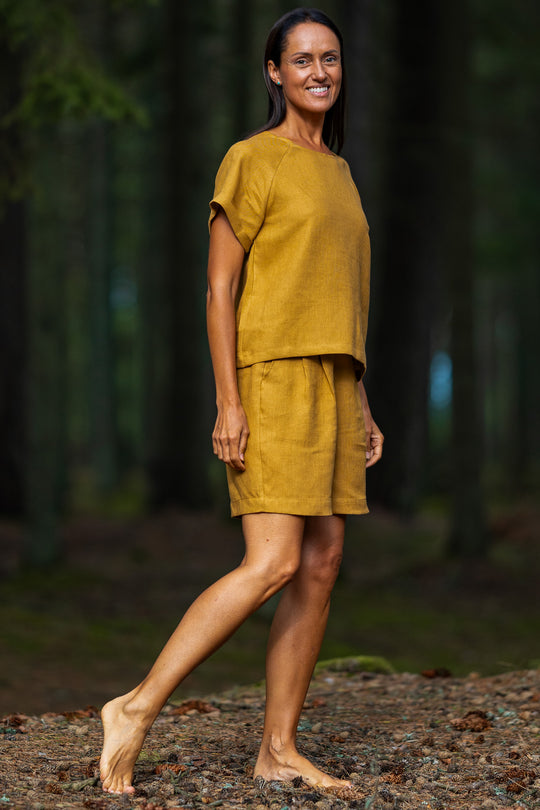 Women Wears Linen Pleated Shorts Bergen In Amber Yellow Color 3 - Daily Linen