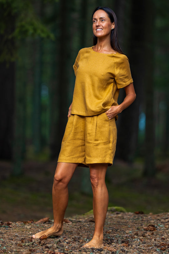 Women Wears Linen Pleated Shorts Bergen In Amber Yellow Color 4 - Daily Linen
