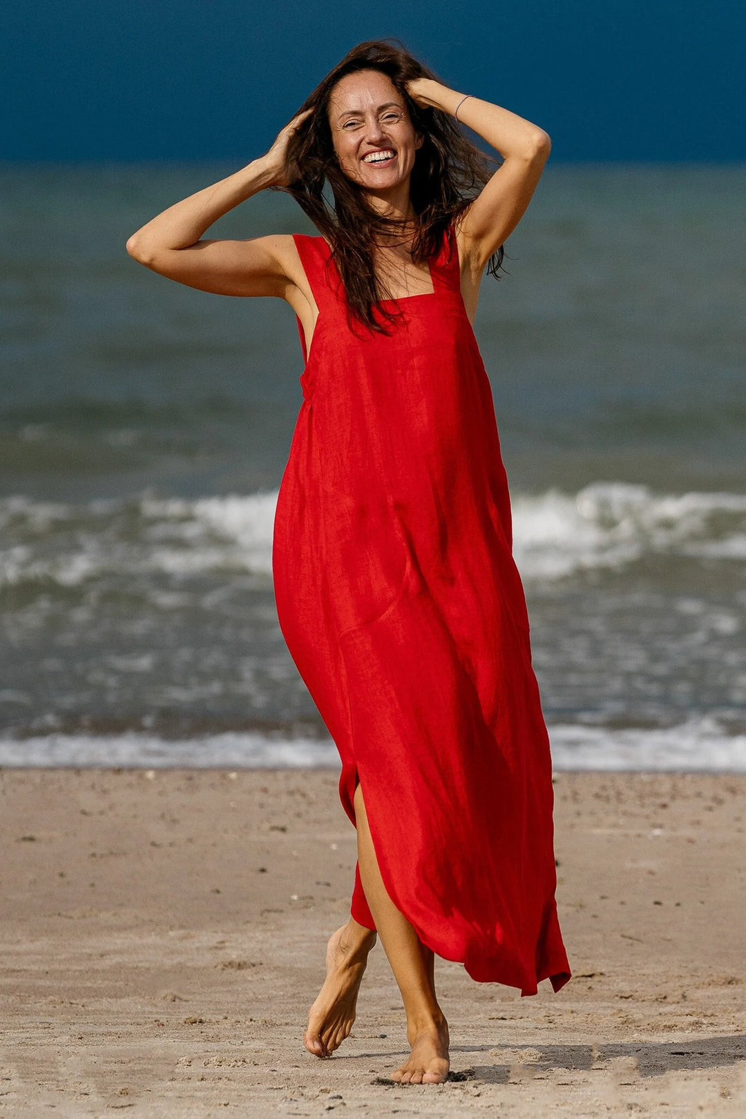 Model Wears Linen Strap Maxi Dress Adele In Red Color 