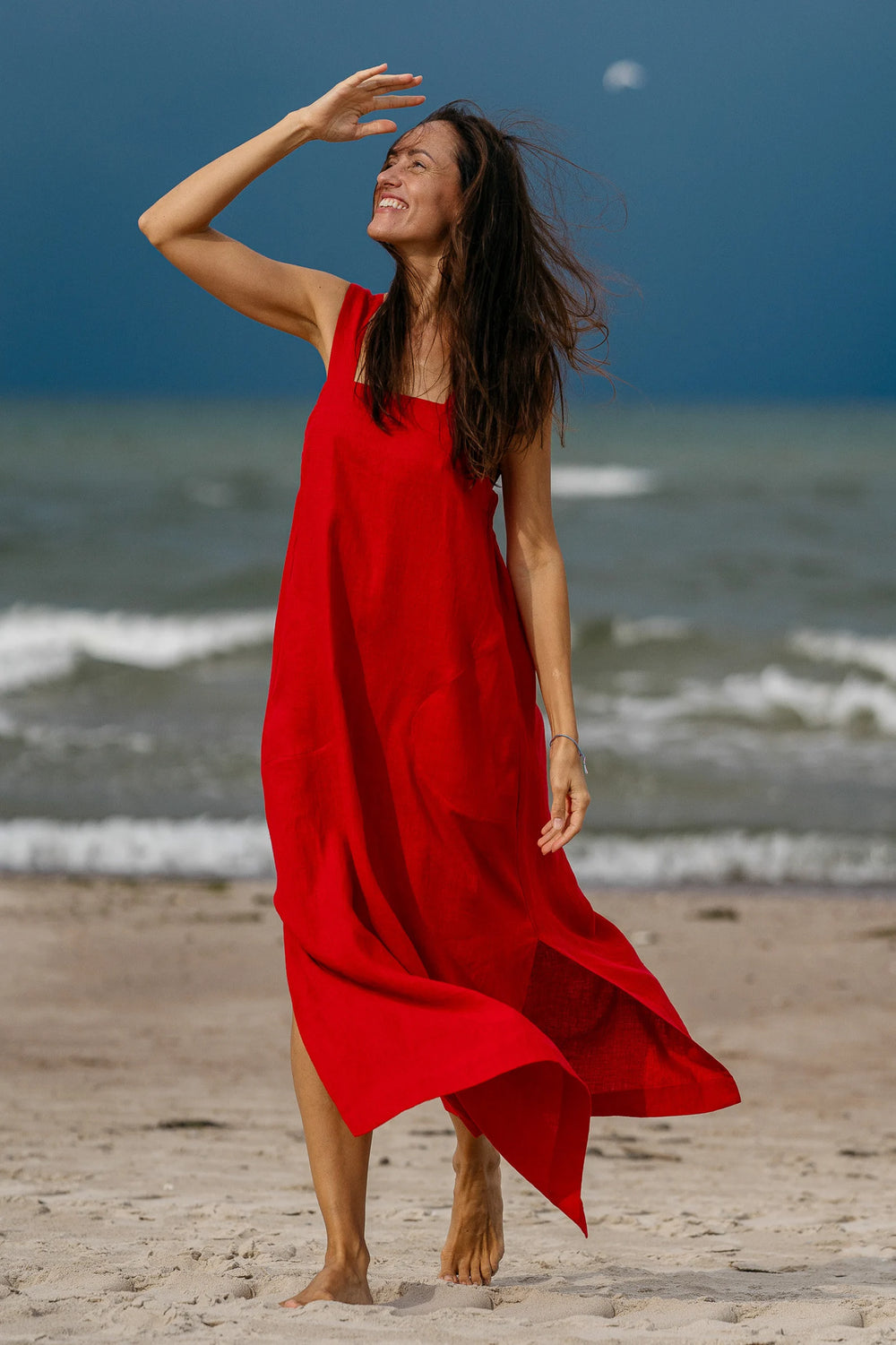 Model Wears Linen Strap Maxi Dress Adele In Red Color 1