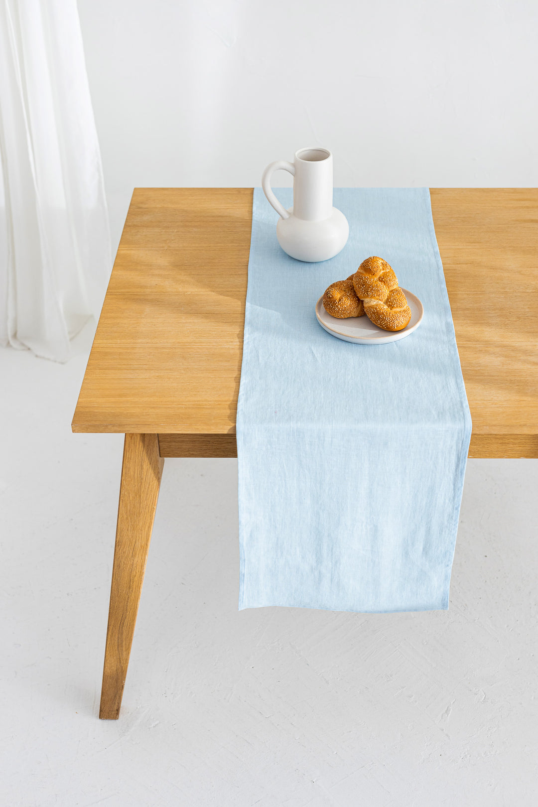 Table Decorated With Sky Blue Color Linen Table Runner - Daily Linen