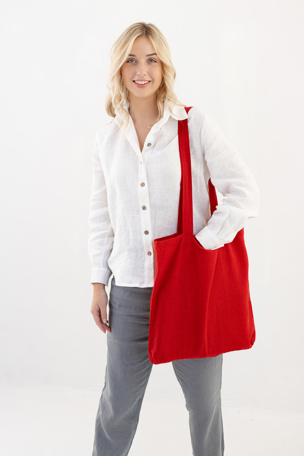 Model Demonstrates Linen Tote Bag In Red Color 1 - Daily Linen