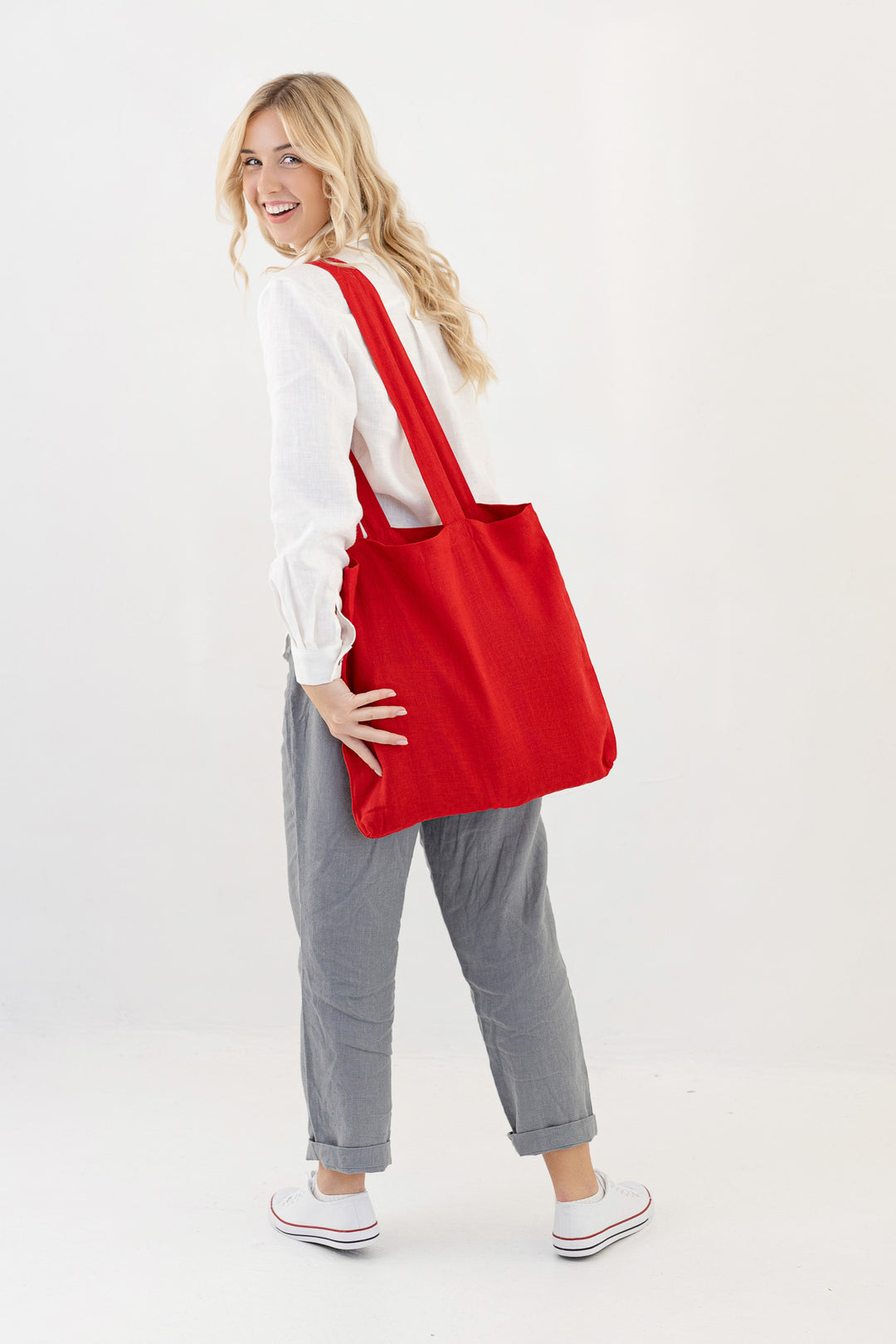 Model Demonstrates Linen Tote Bag In Red Color 2 - Daily Linen