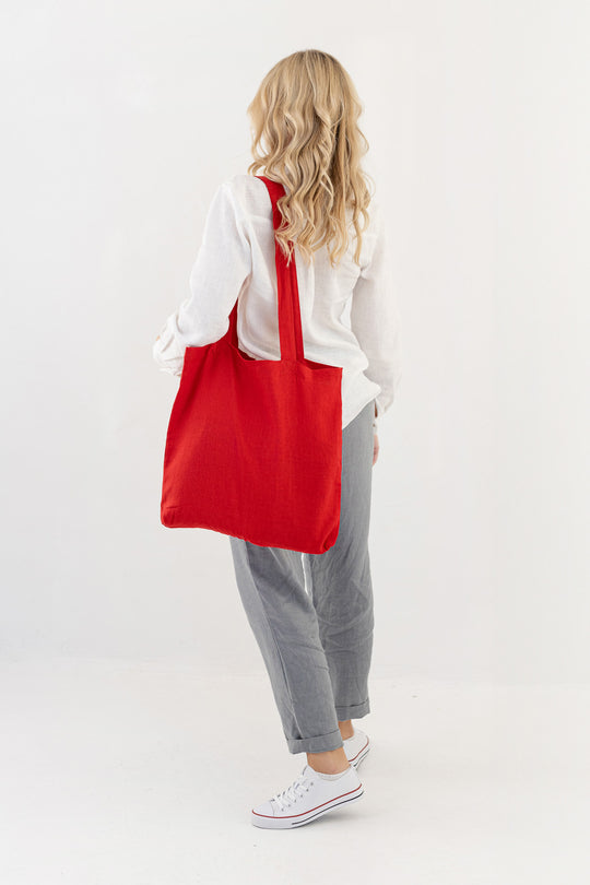 Model Demonstrates Linen Tote Bag In Red Color 3 - Daily Linen