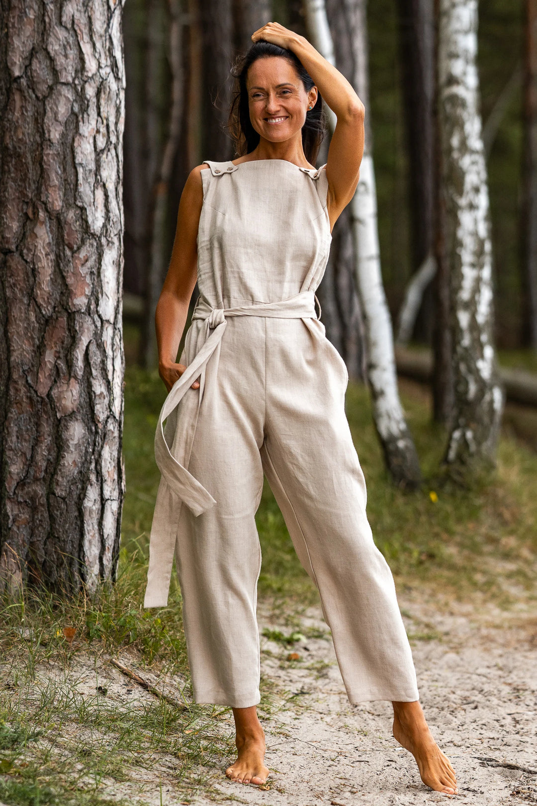 Women In Forest Demonstrates Linen Wrap Jumpsuit Dicey In Natural Color - Daily Linen