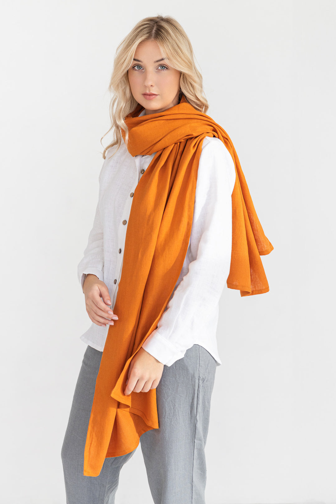 Model Demonstrates Linen Scarf In Mustard Color 2