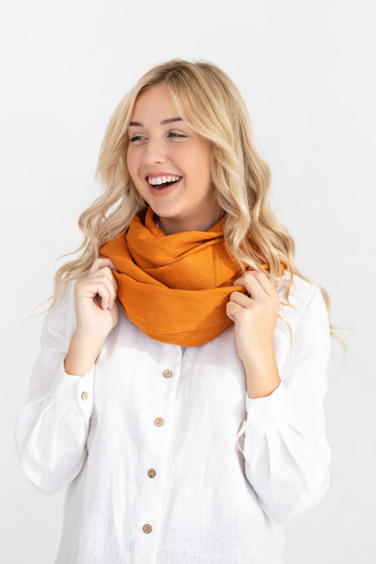 Model Demonstrates Linen Scarf In Mustard Color 3