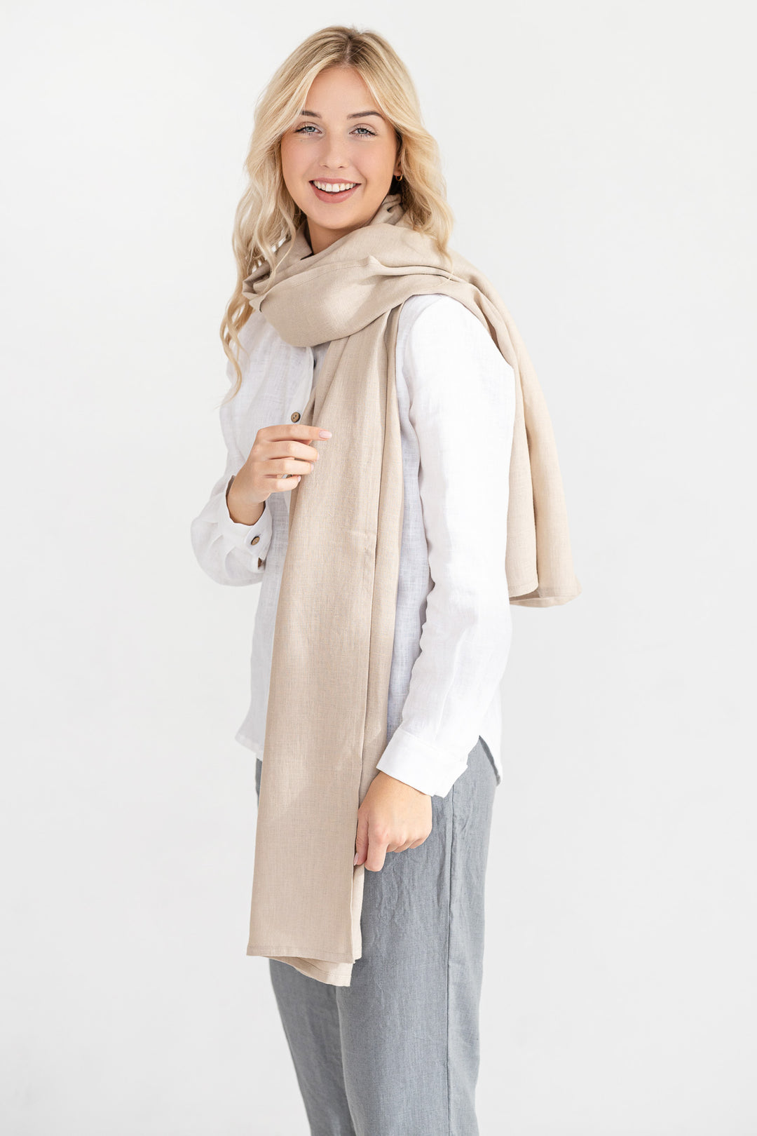 Model Demonstrates Linen Scarf In Natural Color 3