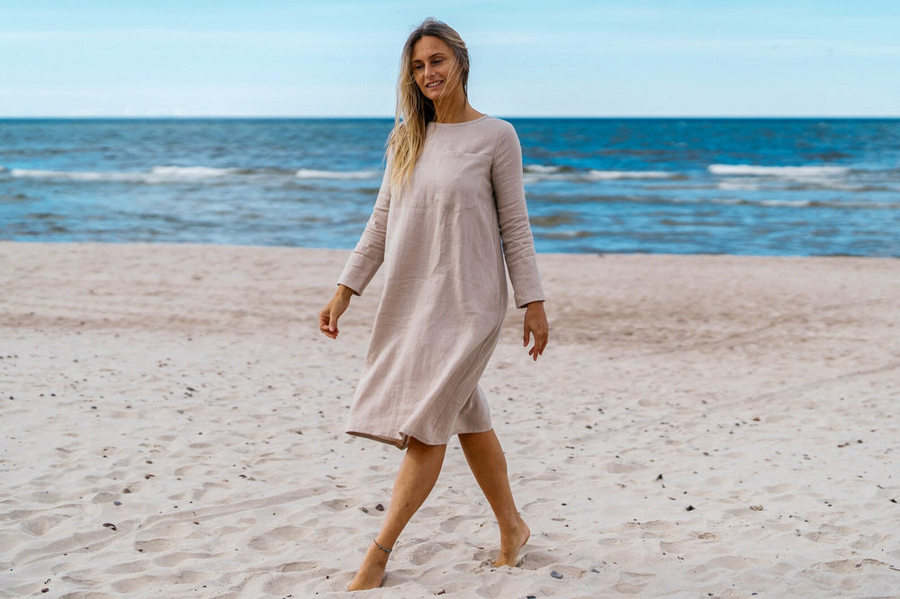 Model Demonstrates Linen Oversized Dress AURA Natural Color In Beach 1 - Daily Linen