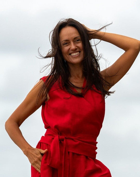 Model Demonstrates Sleeveless Linen Wrap Top Julia In Red Color - Daily Linen