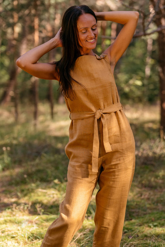 Model Wears Linen Jumpsuit Dicey In Amber Yellow Color 2 - Daily Linen