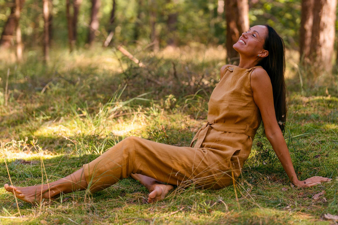 Model Wears Linen Jumpsuit Dicey In Amber Yellow Color 4 - Daily Linen