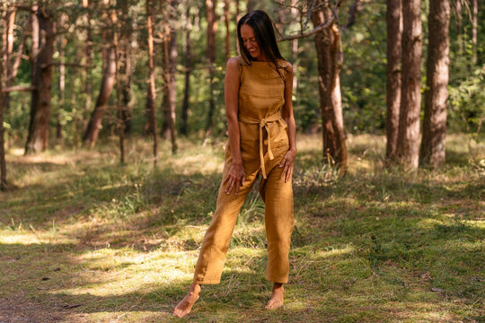 Model Wears Linen Jumpsuit Dicey In Amber Yellow Color 6 - Daily Linen
