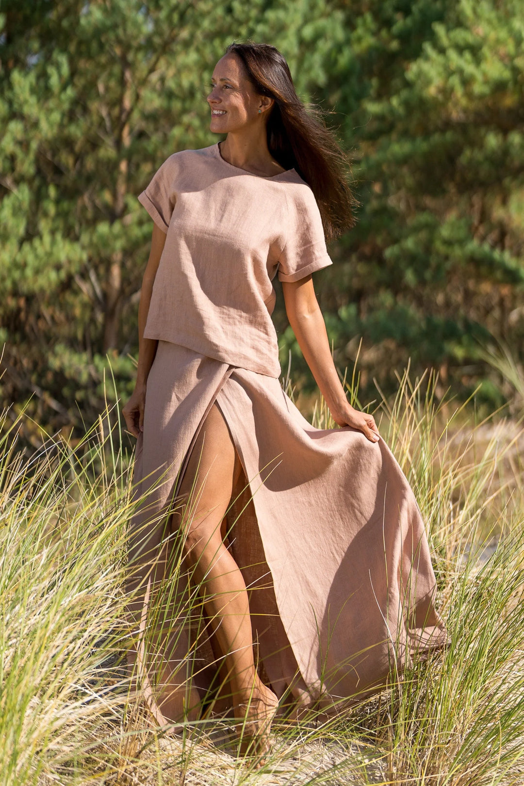 Model In Beach Demonstrates Linen Wrap Maxi Skirt In Powder Color 4 - Daily Linen