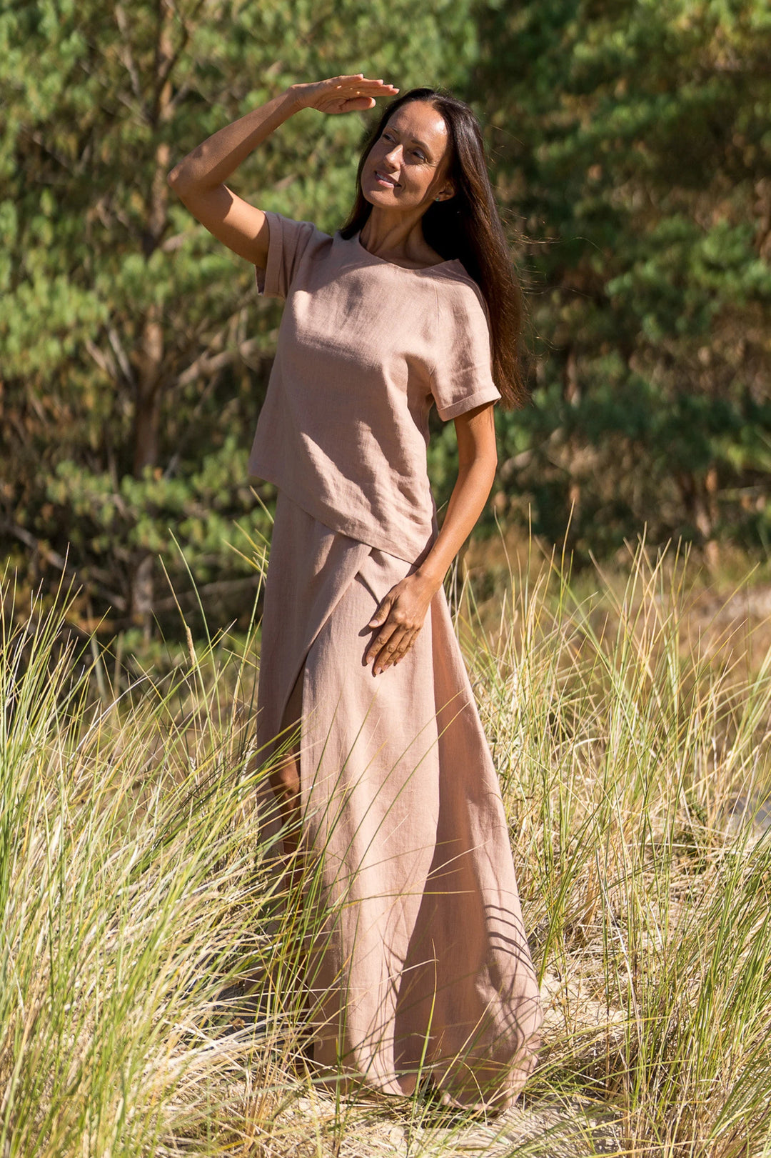 Model In Beach Demonstrates Linen Wrap Maxi Skirt In Powder Color 5 - Daily Linen