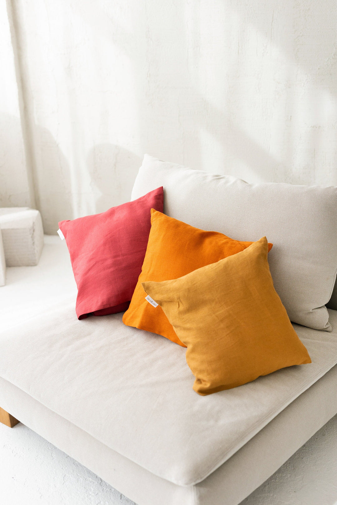 Deco Pillow Covers On Sofa In Various Colors