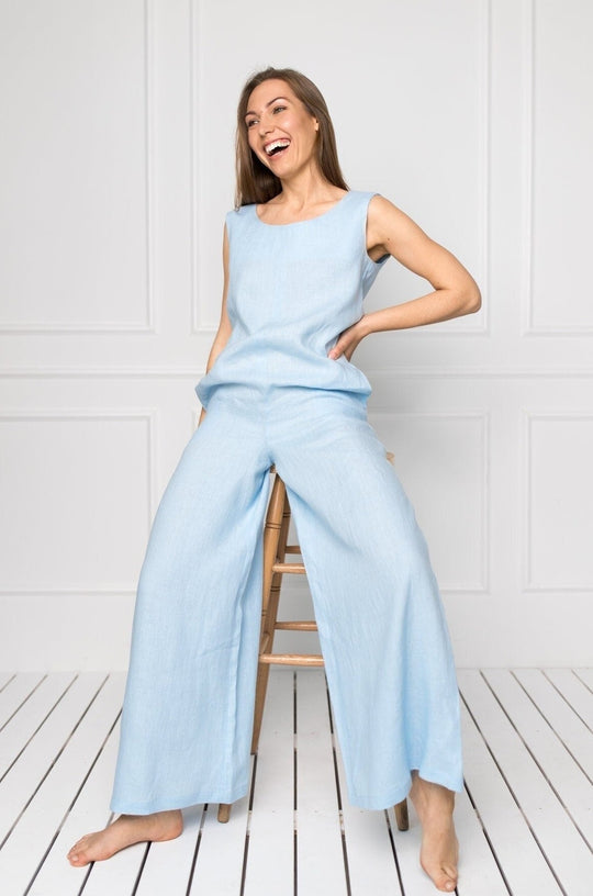 Model Wears Linen Oversized Jumpsuit RAFAELLA In Sky Blue Color - Daily Linen