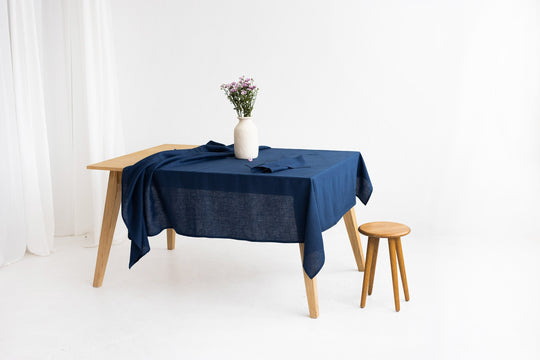 Table Decorated With Midnight Blue Color Linen Tablecloth