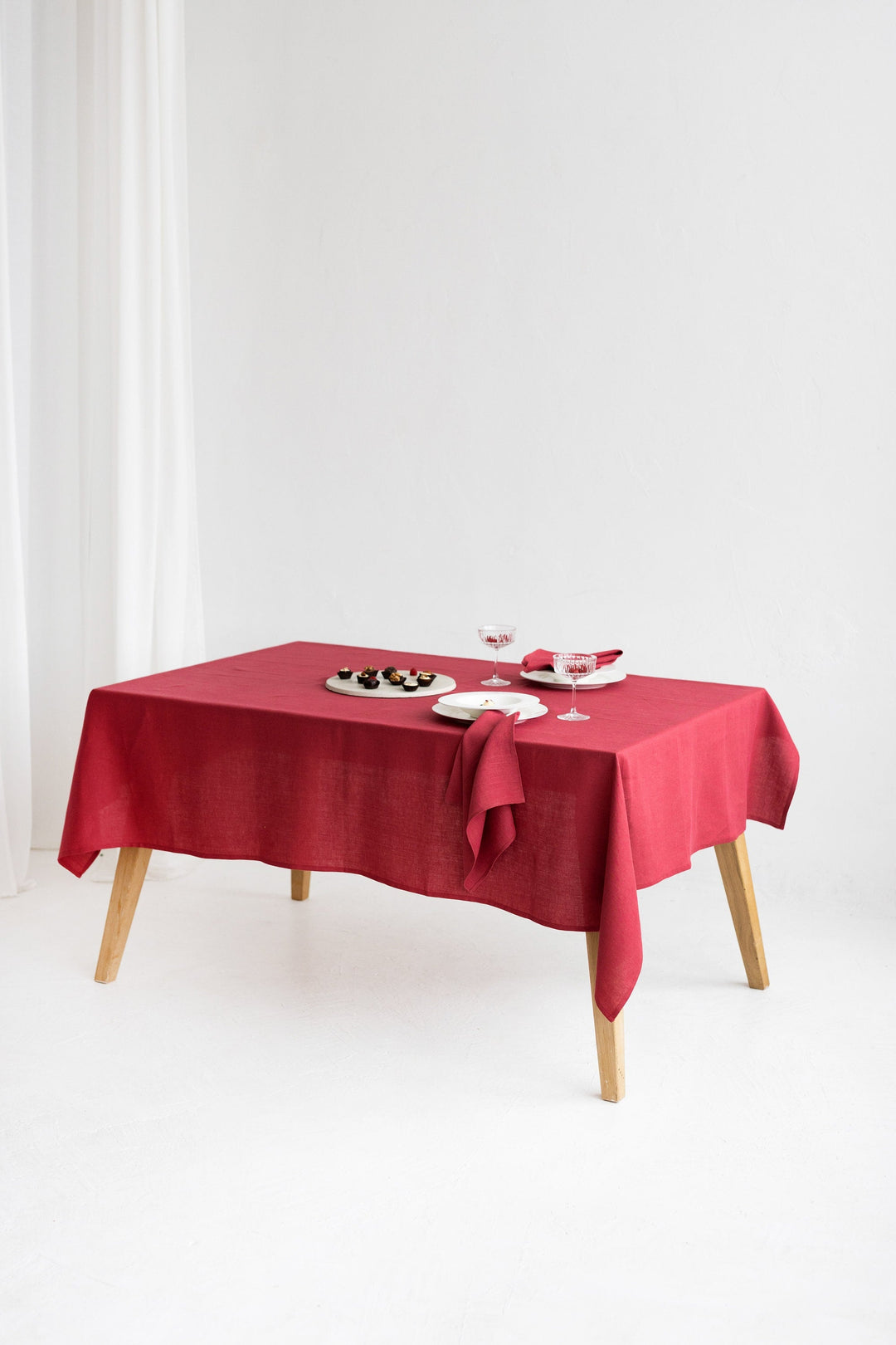 Linen Tablecloth In Raspberry Color Served On Table - Daily Linen