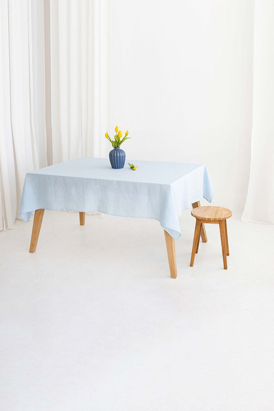 Women Serves Table With Linen Tablecloth In Sky Blue Color 2 - Daily Linen