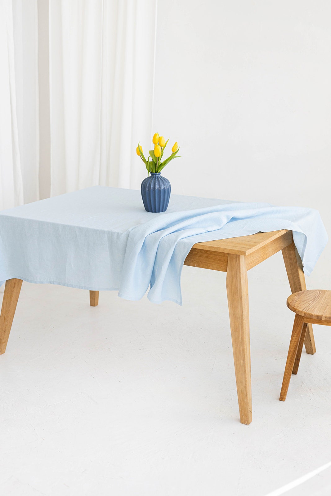 Women Serves Table With Linen Tablecloth In Sky Blue Color 4 - Daily Linen