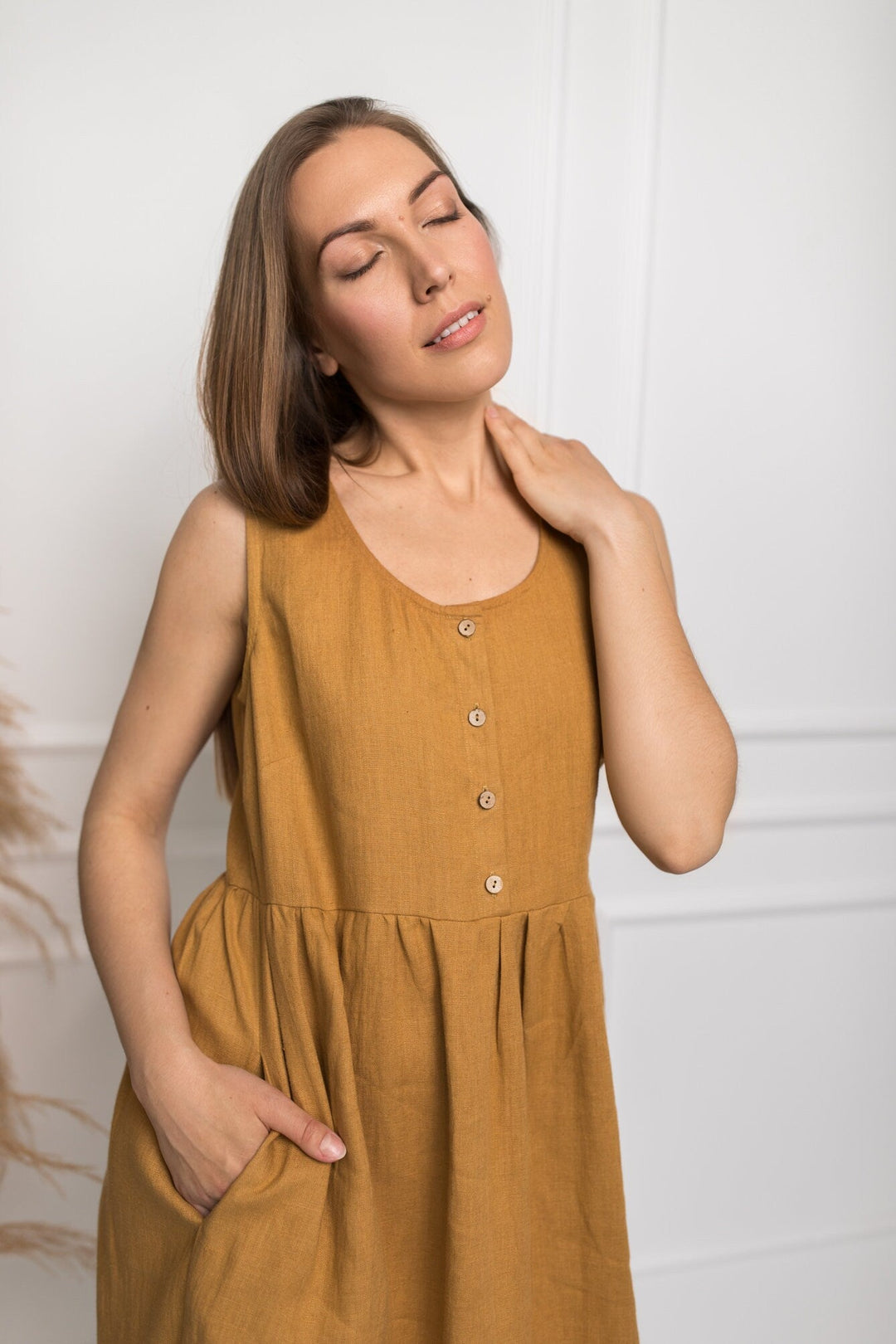 Model Wears Sleeveless Linen Dress Barbara In Amber Yellow Collor Made By Daily Linen 1
