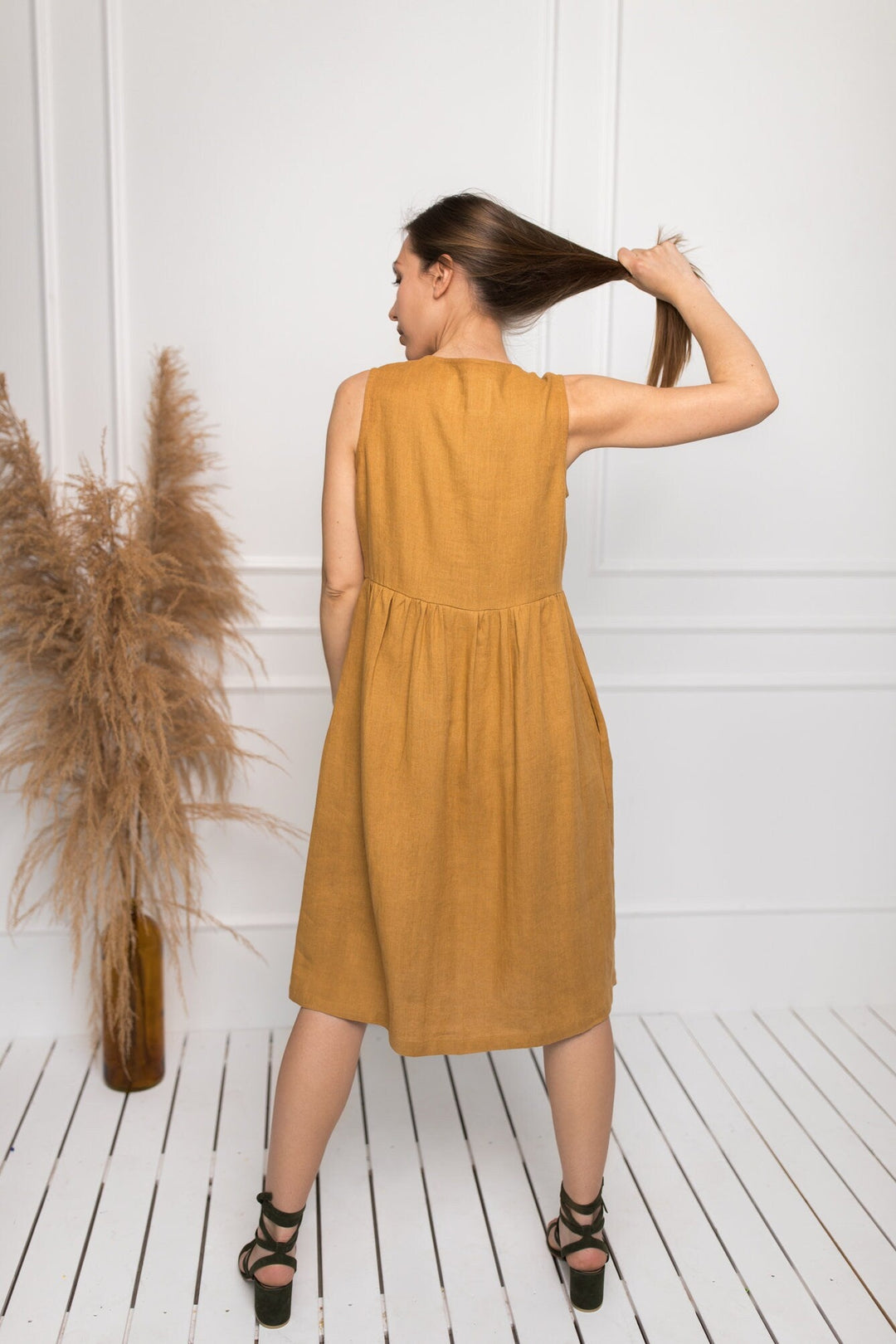 Model Wears Sleeveless Linen Dress Barbara In Amber Yellow Collor Made By Daily Linen 2