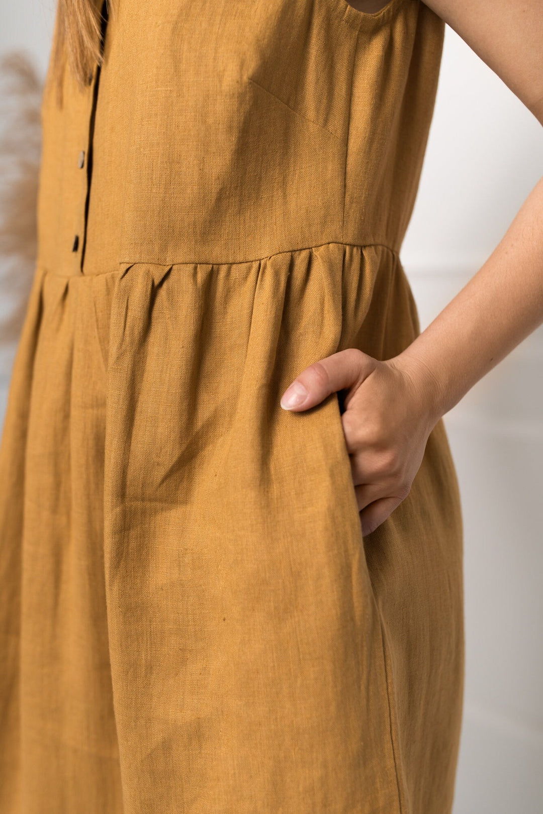 Model Wears Sleeveless Linen Dress Barbara In Amber Yellow Collor Made By Daily Linen 4