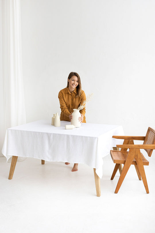 Women Serves Table With Linen Tablecloth In White Color 1 - Daily Linen
